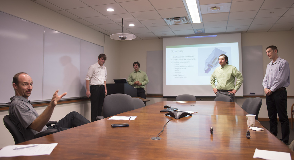 Engineering students giving presentation