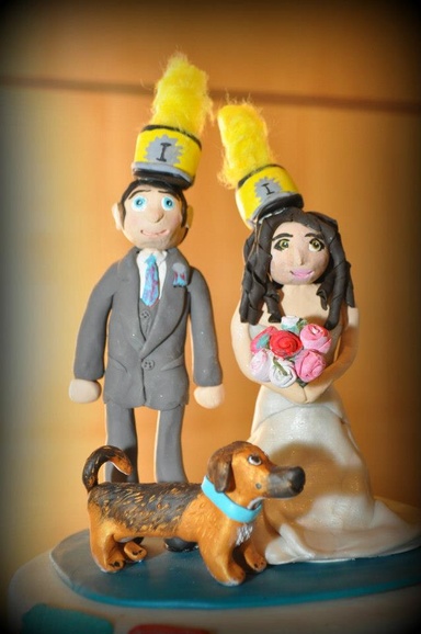 photo of clay wedding cake topper made by Megan Harms