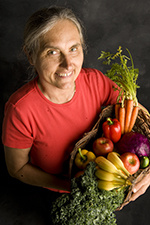 terry wahls holding basket full of fruits and veggies