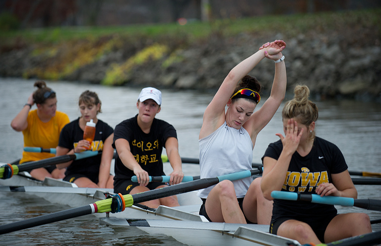 Rowers take a break on the boat.