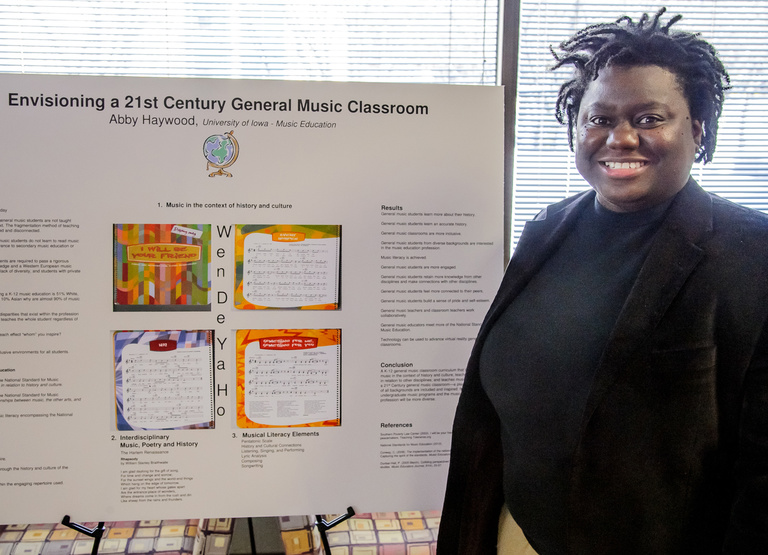 Abby Haywood and her research poster.