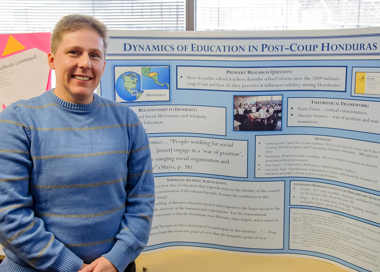 Kate Kedley and her research poster.