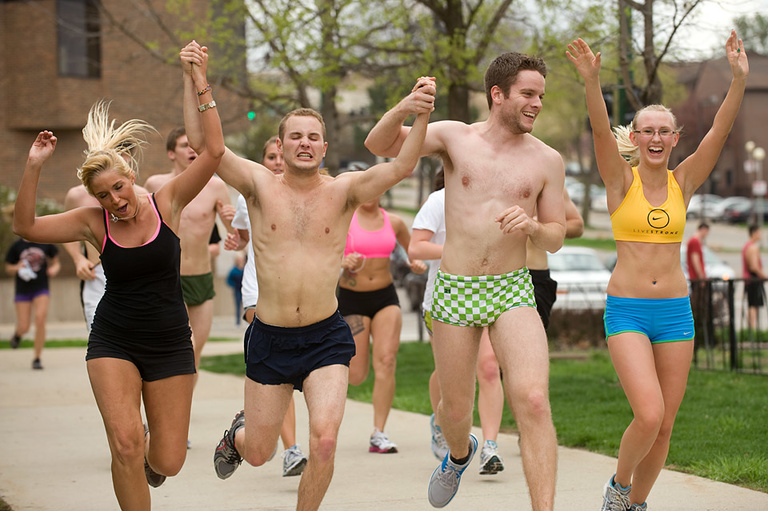 runners participate in the Nearly Naked Mile