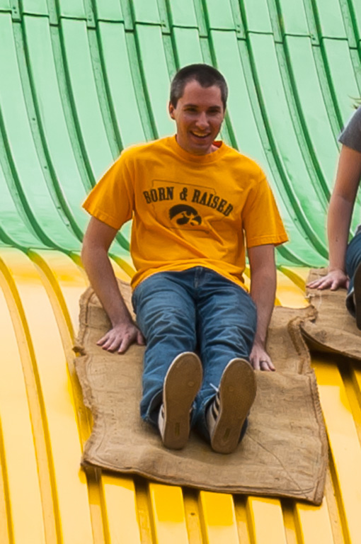 Guy in Hawkeye t-shirt on the slide.
