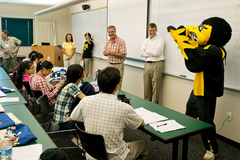 Herky in front of students in classroom