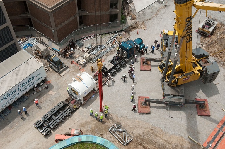 Media photograph the magnet prior to its installation