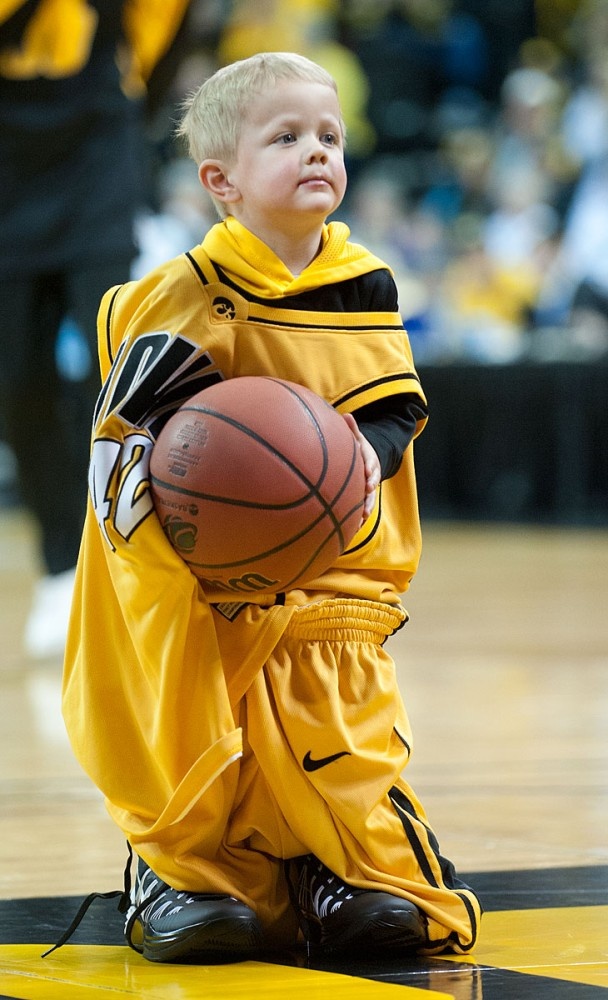 Young fan participates in a timeout dress up promotion