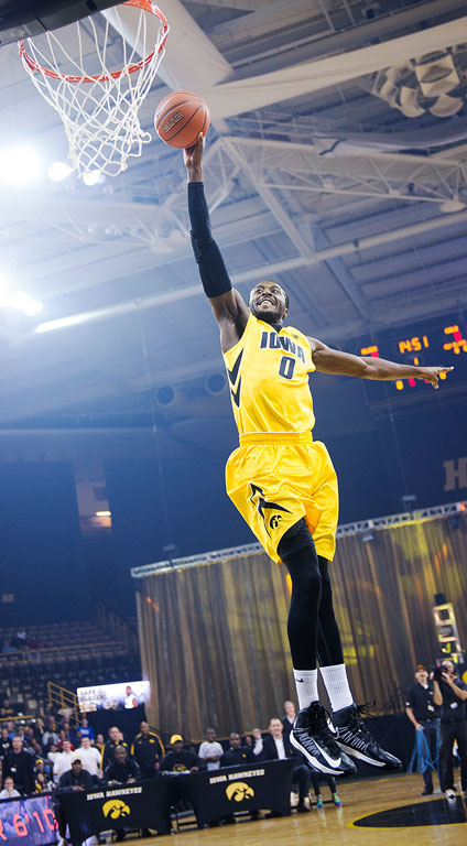 Gabe Olaseni dunks from the free throw line.