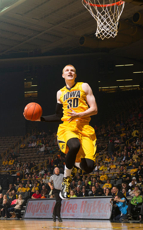 Aaron White goes up for a dunk.