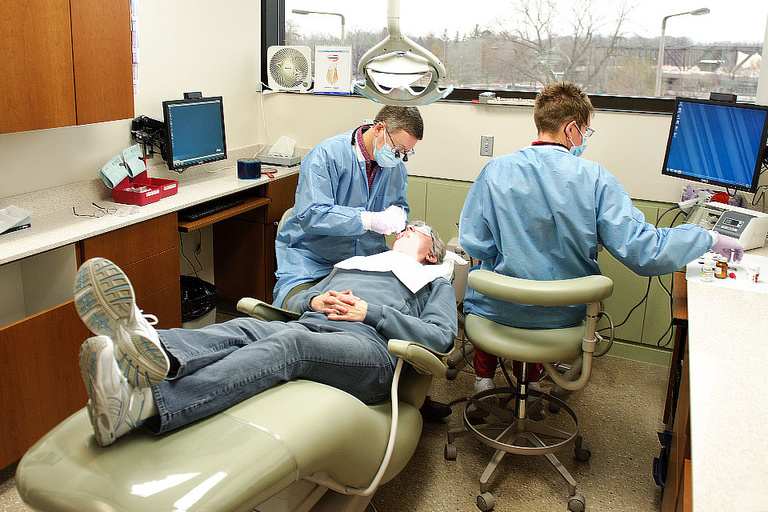 A patient is cared for in a dental clinic.