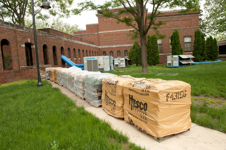 HESCO Barriers are lined up outside of the former UI Museum of Art building on the UI campus.