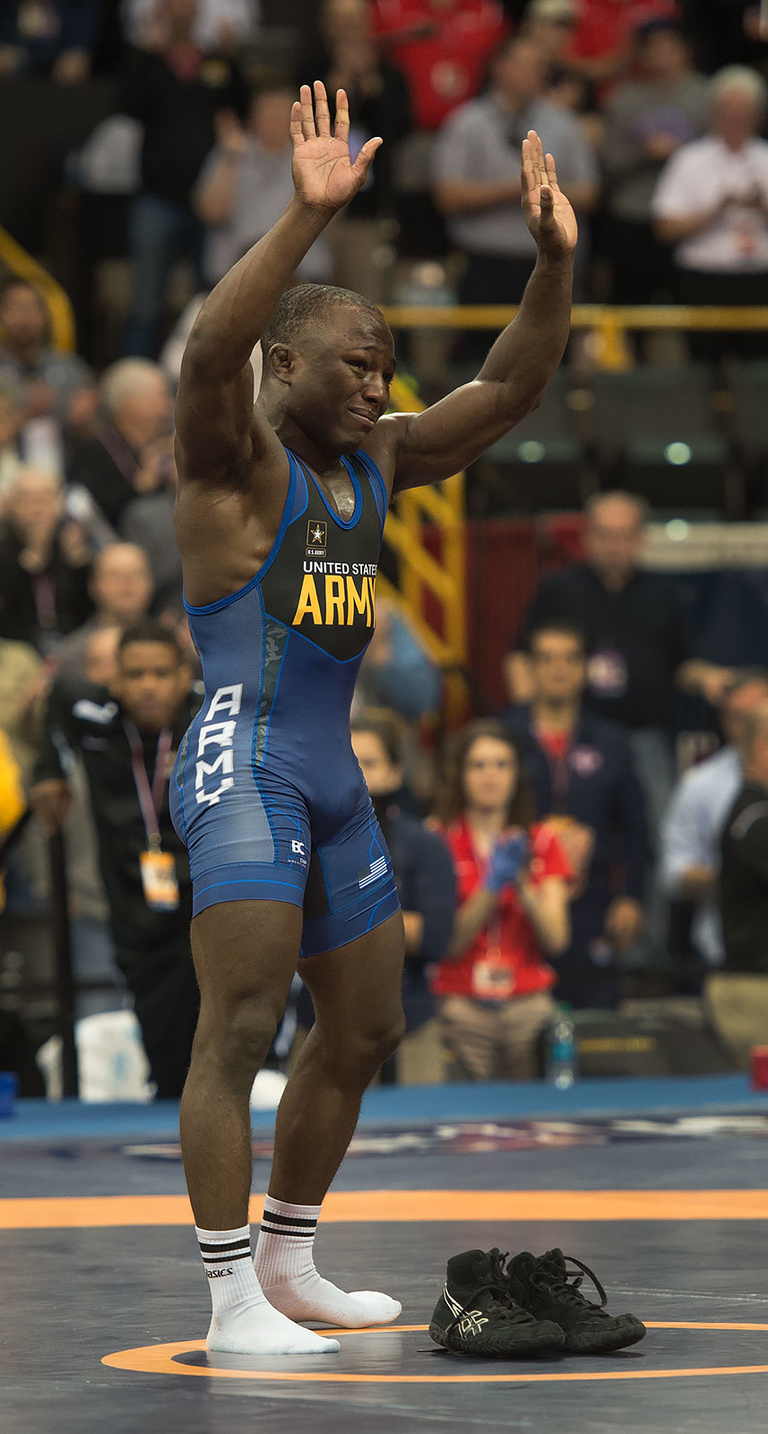 Despite the losses by Iowa wrestlers, day one of the trials was full of drama and special moments such as two-time Olympian Spenser Mango's retirement after losing in the prelims.
