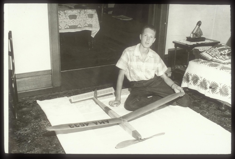 Don Gurnett poses with the Wakefield rubber band-powered model airplane in 1956. He designed and flew the plane in model airplane contests in the late 1950s.