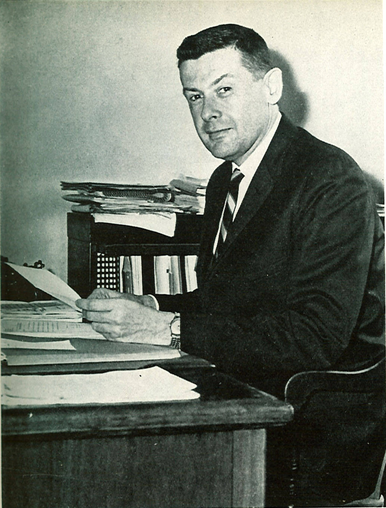 Former President Willard “Sandy” Boyd sits at his desk in 1966.