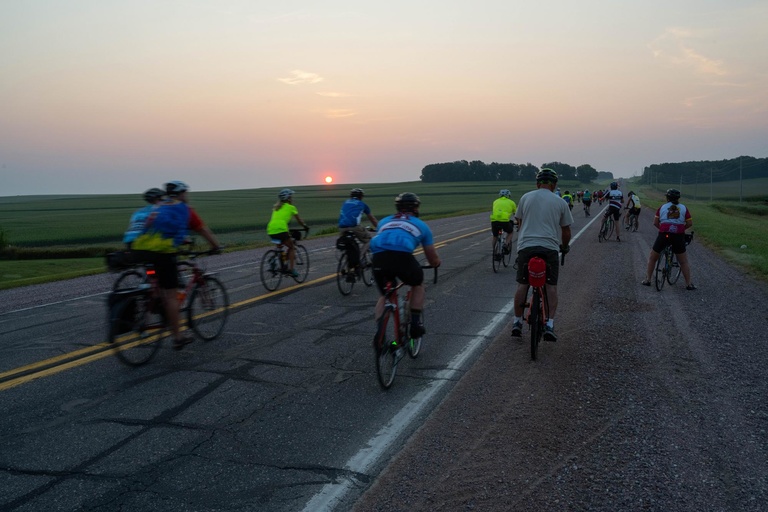 riders against low sun