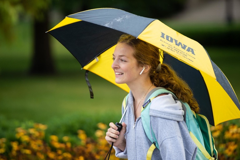 student with umbrella