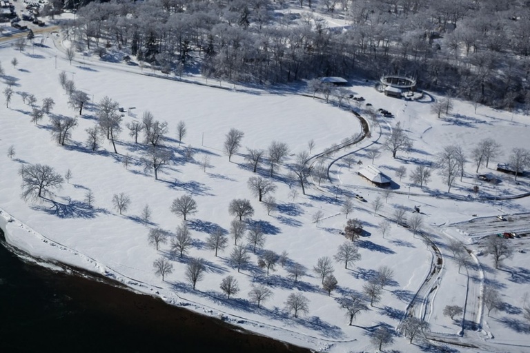 Aerial view of snow covered campus.