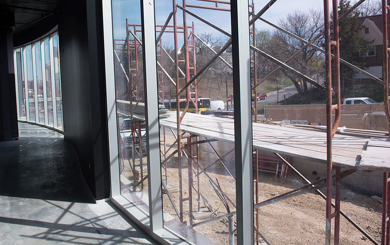 looking out window of Petersen Hall under construction