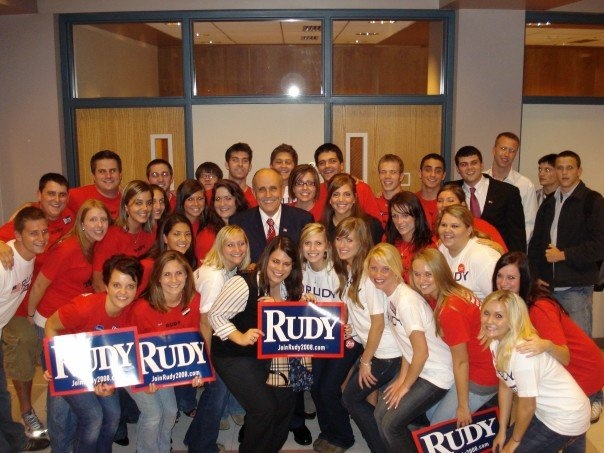 UI students posing with Rudy Giuliani