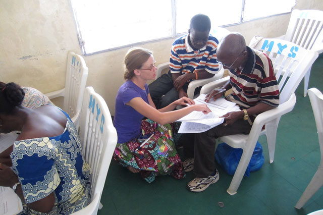 Stephanie Lukas training pharmacy employees in Liberia