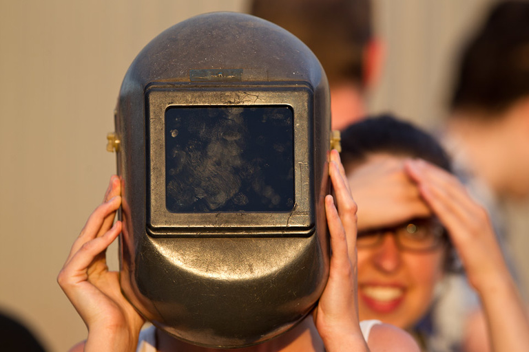 Person looking through a welding mask