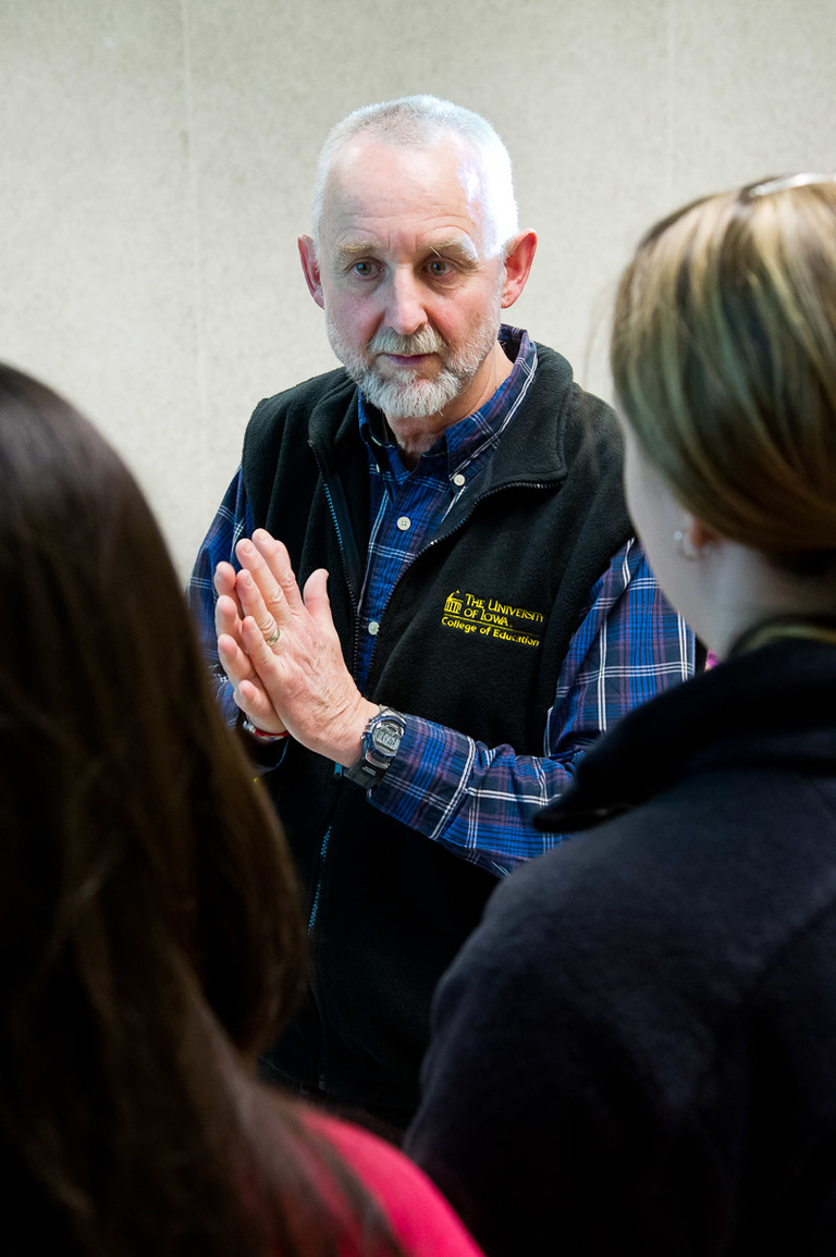 College of Education's Volker Thomas talks to some of his students in Lindquist Center.