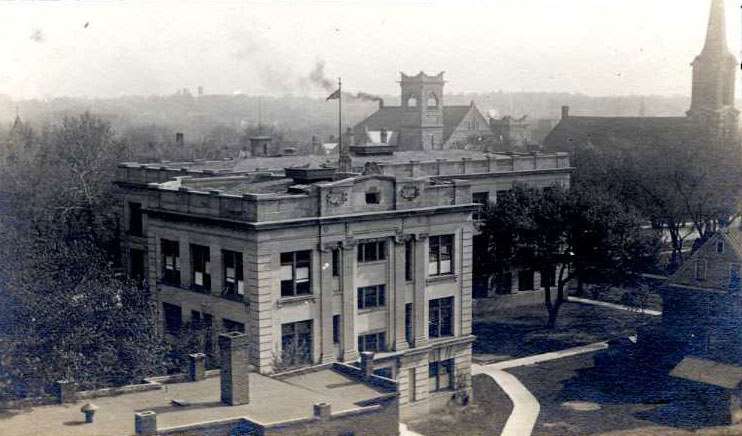 black and white aerial photo of campus along Iowa Avenue