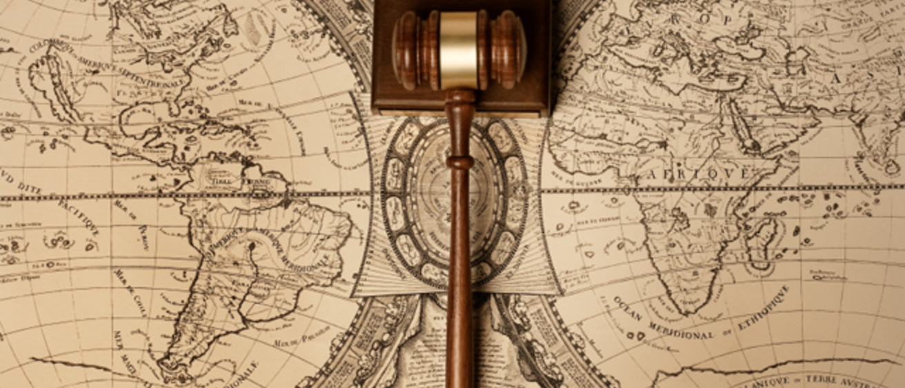 gavel on a world map