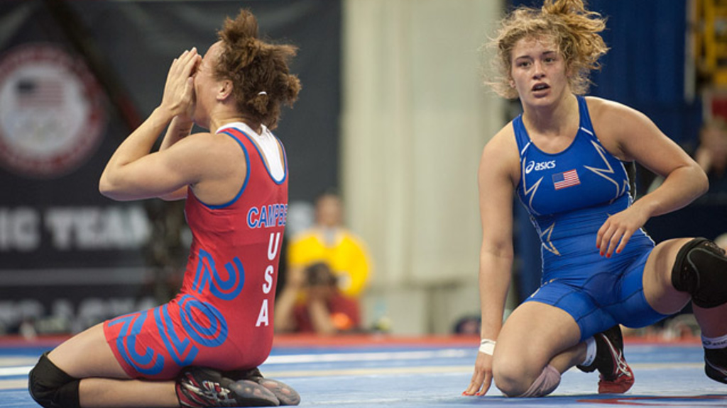 Kelsey Campbell, left, celebrates her Olympic dream while Helen Maroulis looks on in disbelief in the 55-kg competition.