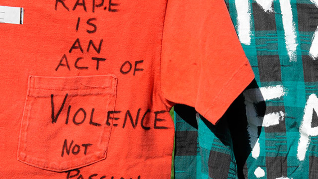 T-shirt reading "Rape is an act of violence not passion."