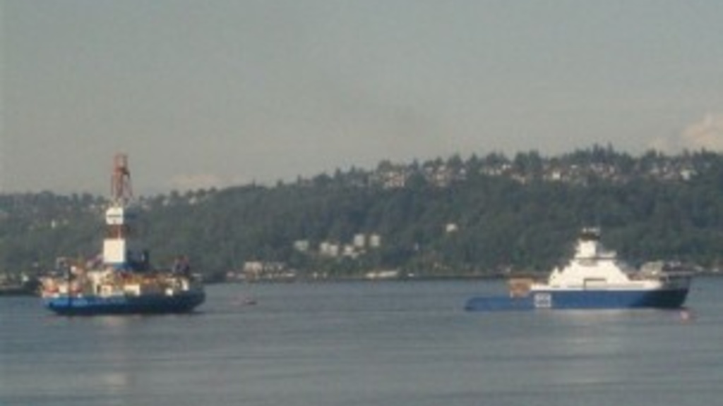 Shell&#039;s Kulluk drilling unit is towed through Seattle&#039;s Elliott Bay in late June 2012, as it begins a long journey to Arctic waters north of Alaska.  (AP Photo/Donna Gordon Blankinship)