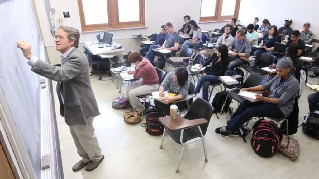 Charles Frohman teaches a graduate-level class