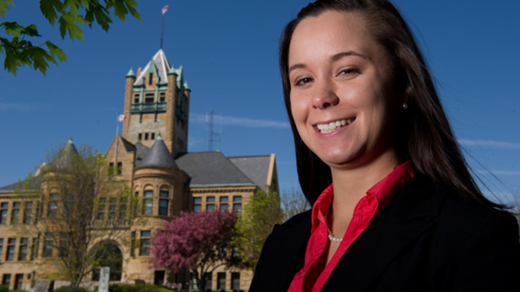 Emily Ehlers in front of the Johnson County Courthouse