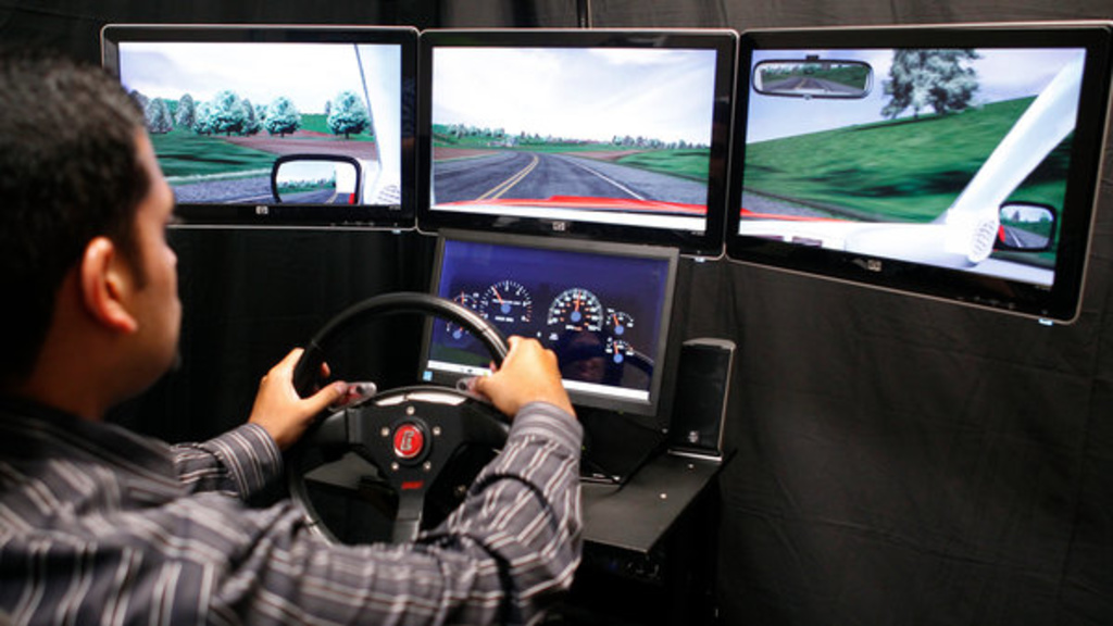 A driving simulator is used in a clinical trial of a sleep drug at NeuroTrials Research in Atlanta.
