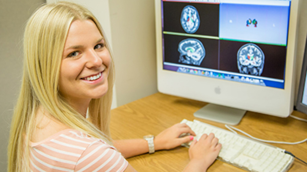 UI senior, Jolene Luther, is spending her 2013 summer in a fellowship position in hopes her contributions will help determine if iron deposits can be detected on MRI scans of Huntington disease (HD) research participants. Her grandfather died of HD in the