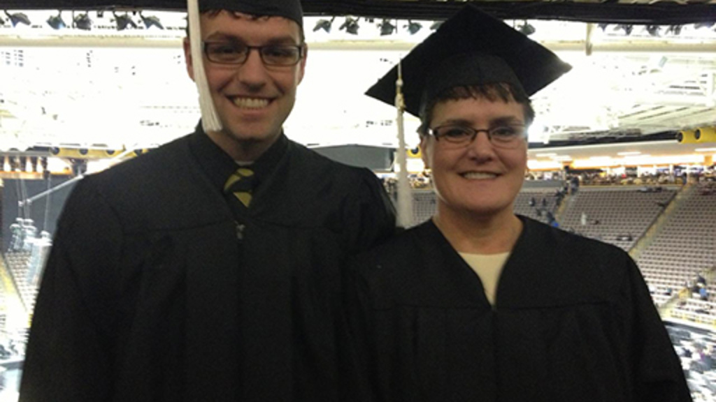 Photo of Leesa Fair and her son, Ben at Carver-Hawkeye Arena for December 2012 graduation