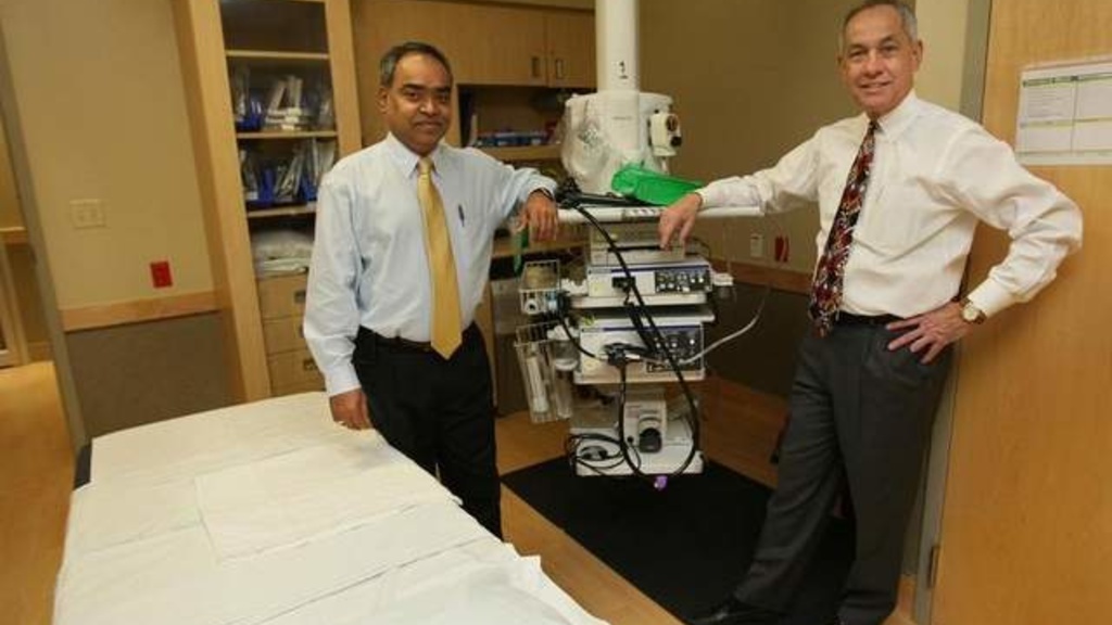 Dr. Ravi Vemulapalli and Dr. Dale Andres, Mercy senior vice-president of medical affairs, anticipate the benefits of a new collaborative effort to diagnose and treat people with diseases of the liver and biliary tract in central and western Iowa. / Mary C