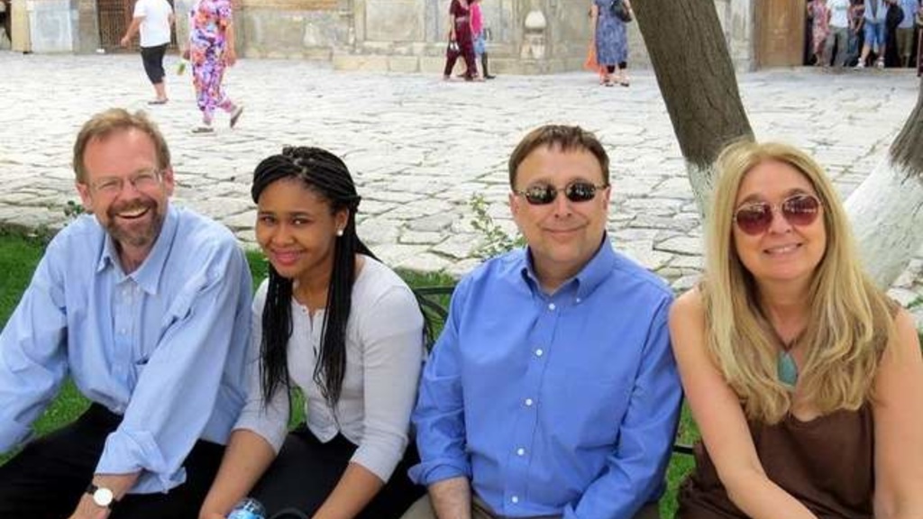 IWP director Chris Merrill, Chinelo Okparanta, Stephen Kuusisto and Ann Hood sit in front of the Registan in Samarkand. / Kelly Bedeian / Special to the Press-Citizen