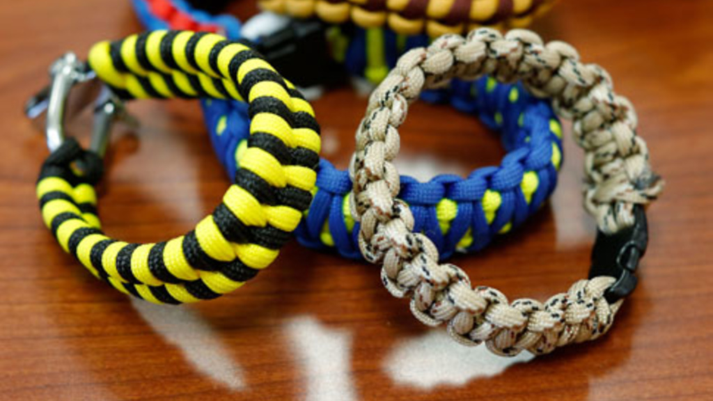 University of Iowa freshman Andy Topping makes paracord bracelets and sells them online. (Brian Ray/The Gazette)