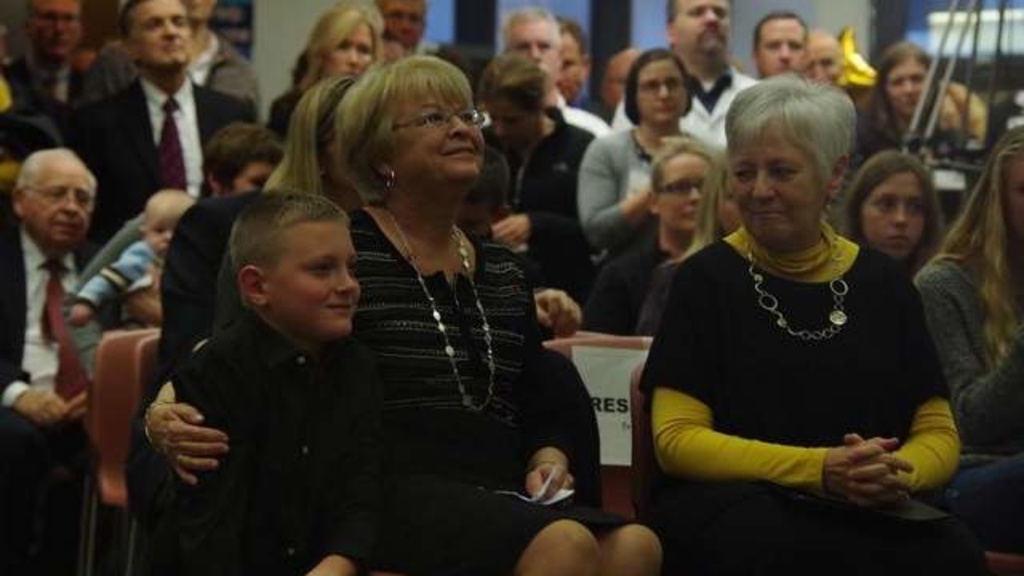 Ann Gerdin, middle, her grandson and University of Iowa President Sally Mason, right, attend the celebration of the Gerdin family&#039;s $12 million donation to the UI Children&#039;s Hospital&#039;s building campaign. / P-C file photo