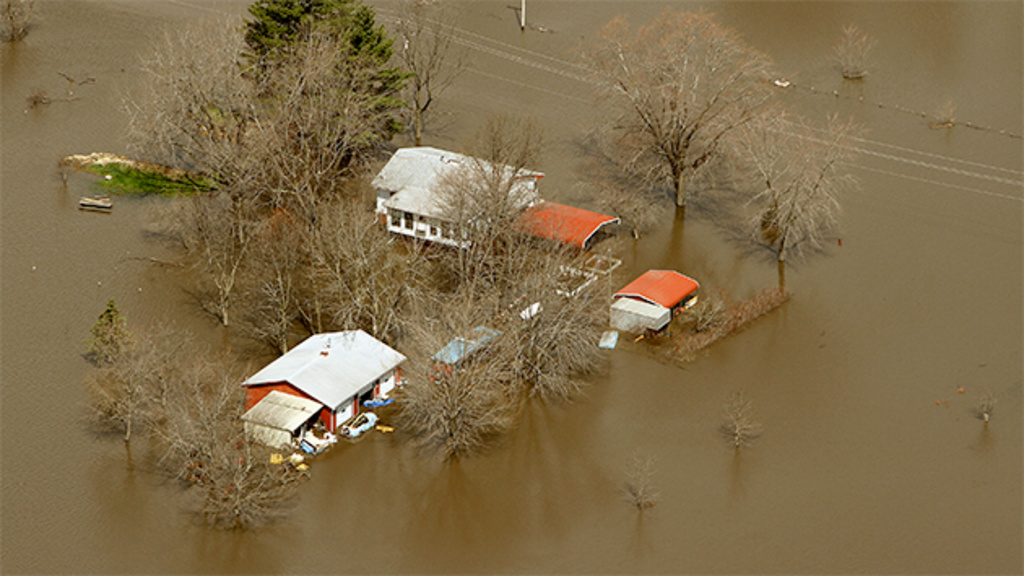 Aerial photo of flooding farm in Midwest.