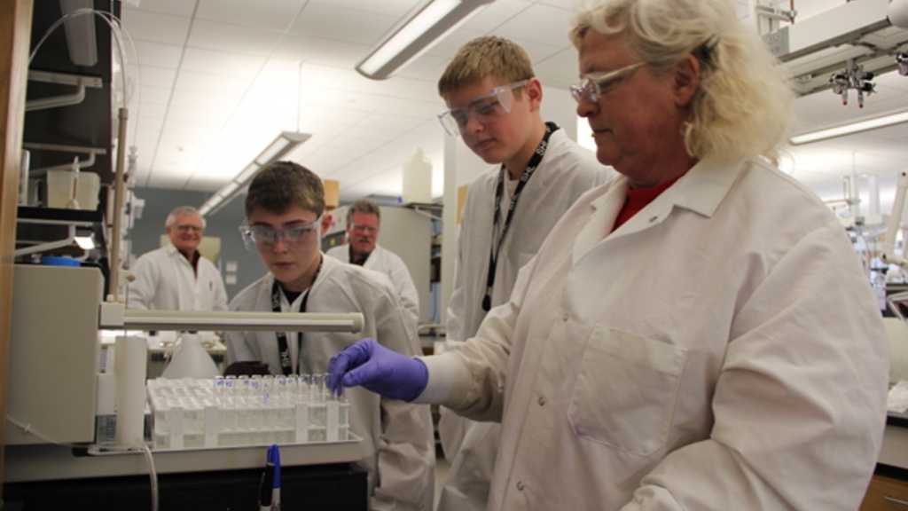 The Hygienic Lab&#039;s Student Mentorship Program gives young Iowans such as Moeller (left) and Wills an opportunity to observe laboratory scientists like Cindy Rieflin (right) at work. 