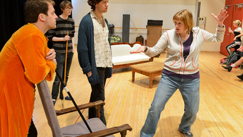 Kristin Clippard works with actors during rehearsal