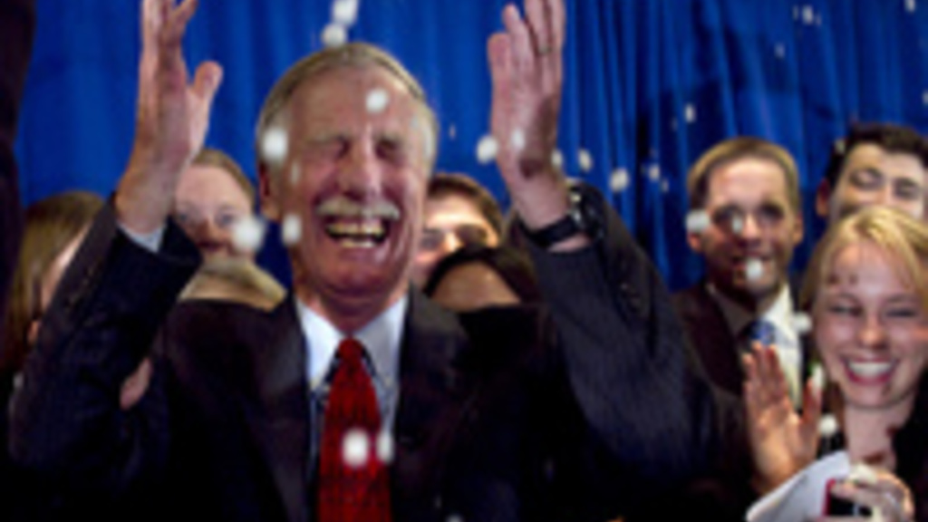 Independent Angus King celebrates under a splash of champagne in Freeport, Maine, on Tuesday after winning the Senate seat vacated by Republican Olympia Snowe.