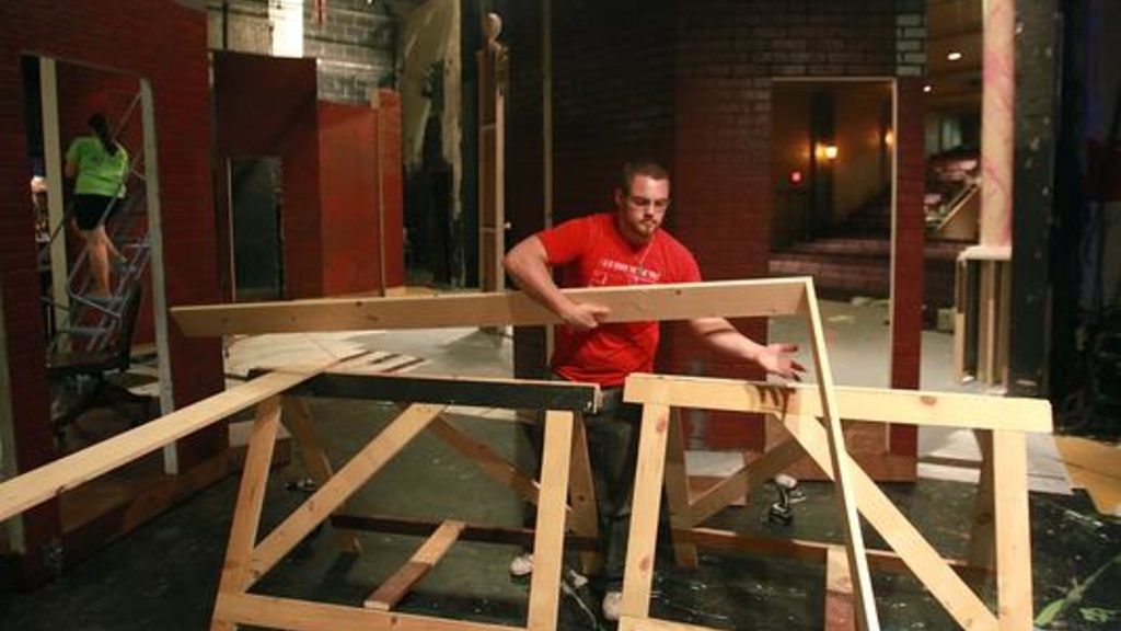 Randy Young interns at the Des Moines Playhouse, helping to build a wooden set for an upcoming production. Photo by Bryon Houlgrave/The Des Moines Register