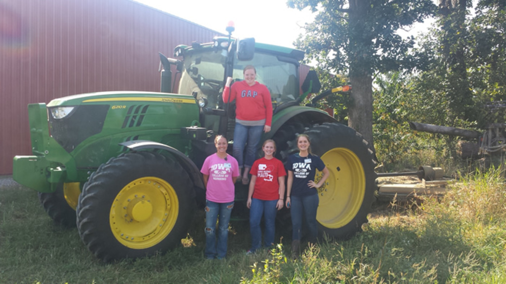 Four UI nursing students learn about public health issues at an area farm