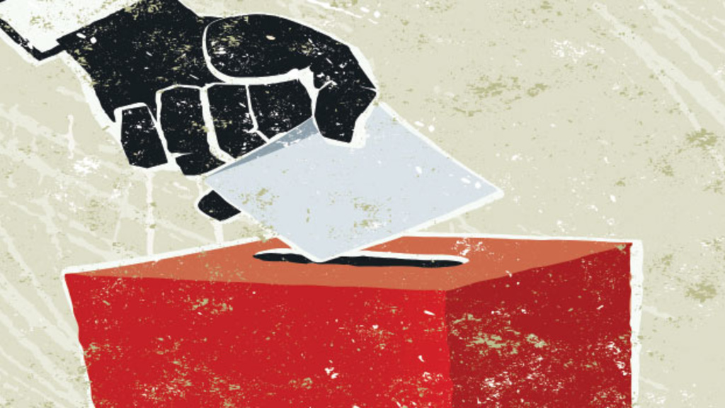 An illustration of a hand dropping a paper vote into a red ballot box
