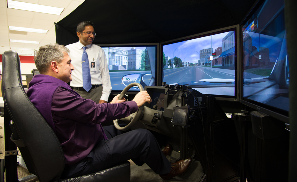 Igor Magomedovich Isaev experiences the National Advanced Driving Simulator.