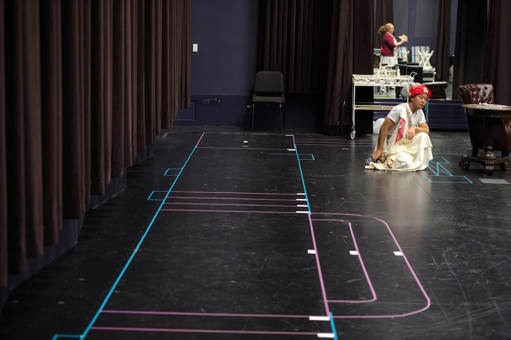 opera rehearsal space with stage dimensions indicated in tape on the floor