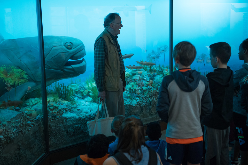 ken atkinson and elementary students by natural history museum dunkleosteus 